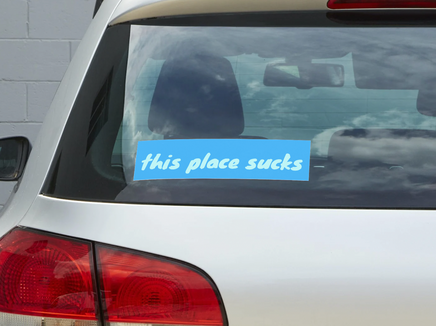This Place Sucks Sticker